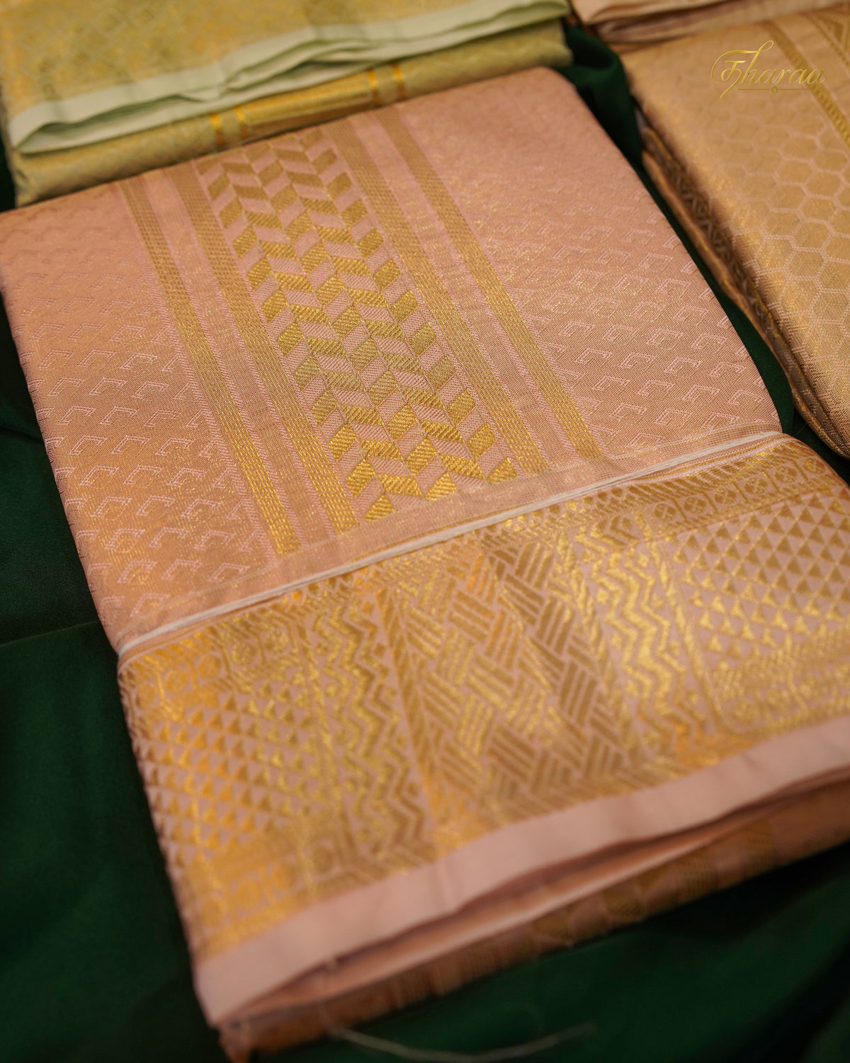 HEMAVARMAN dhoti is crafted from semi-silk fabric with a gold border and embossed design, combining durability and traditional aesthetics. Its semi-silk composition provides a balanced texture and sheen, suitable for formal occasions. The gold border enhances visual appeal while maintaining structural